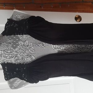 Black vest with lace accent